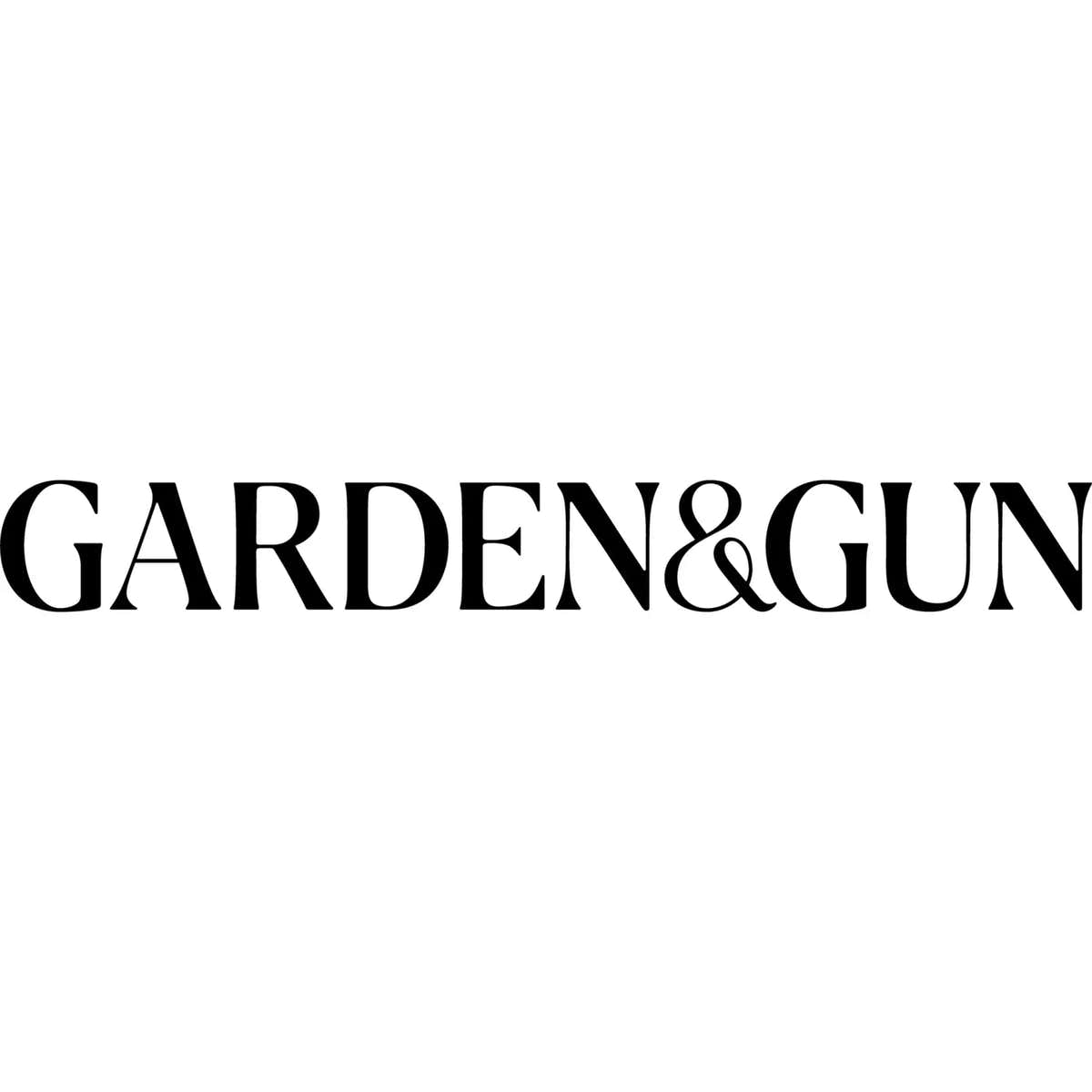 Garden and Gun in black serif capital letters with an ampersand fused between the two words, on a white background