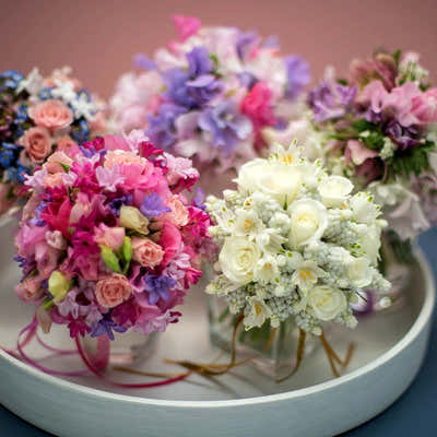
                    
                      Bridal Bouquets Class bouquet-making class workshop experience with pastel pink and purple blooms
                    
                  