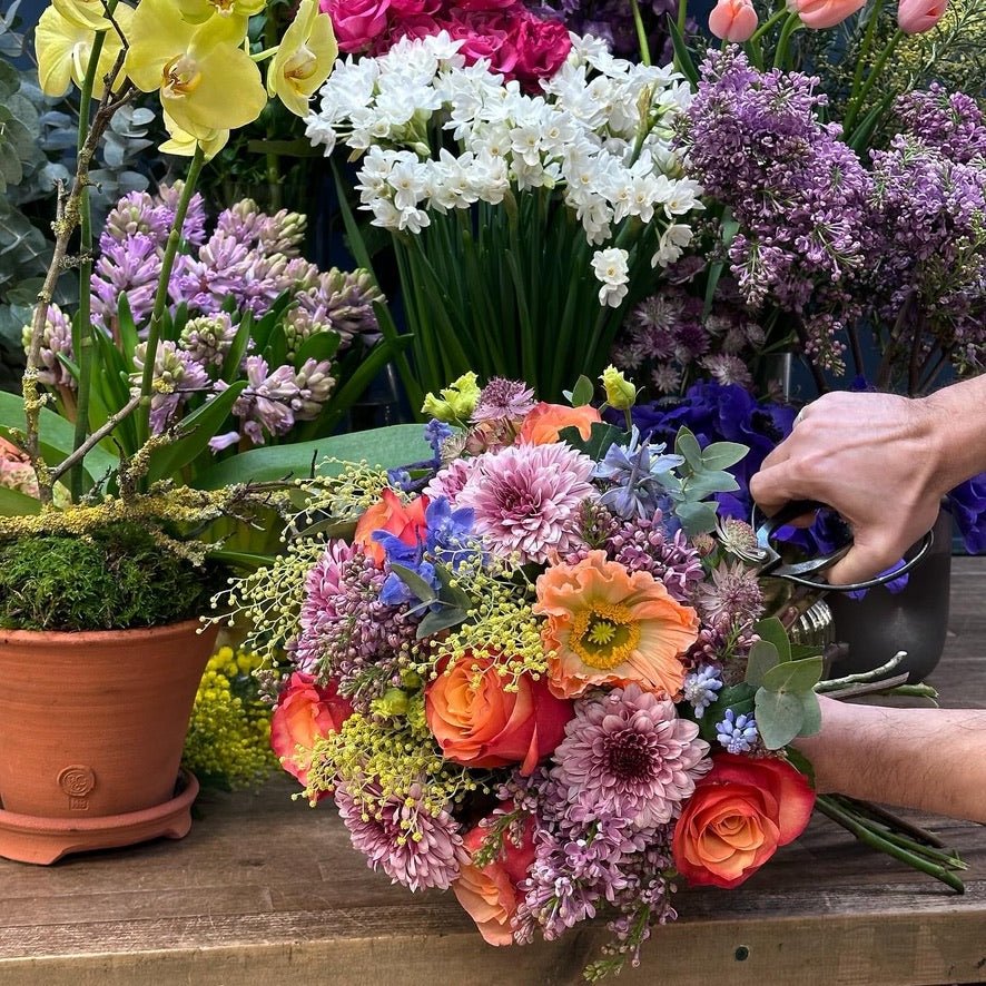 "Florist Choice bespoke bouquet being hand-crafted at Pulbrook & Gould's London shop — seasonal blooms selected by master florists