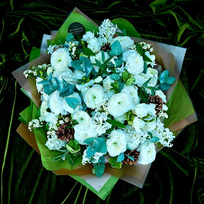
                    
                      Hand Tied Bouquet Class Pulbrook and Gould floral workshop experience class in South Kensington studio with pale blue flowers
                    
                  