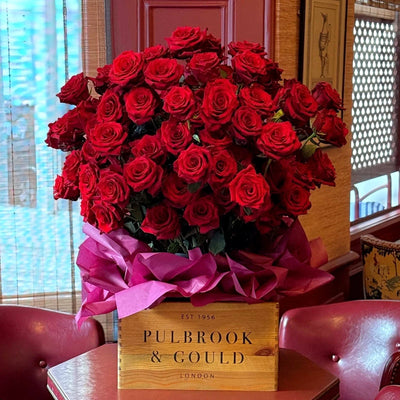 
                    
                      Long-Stemmed Roses by Pulbrook Gould, red fresh-cut long-stem roses bouquet with tightly layered petals
                    
                  