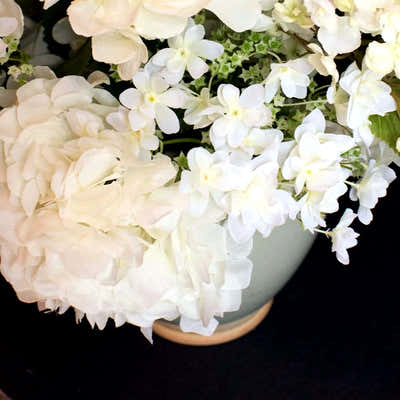 
                    
                      Mixed White Hydrangea Arrangement by Pulbrook and Gould faux flower arrangement in a ceramic pot with silk blooms
                    
                  