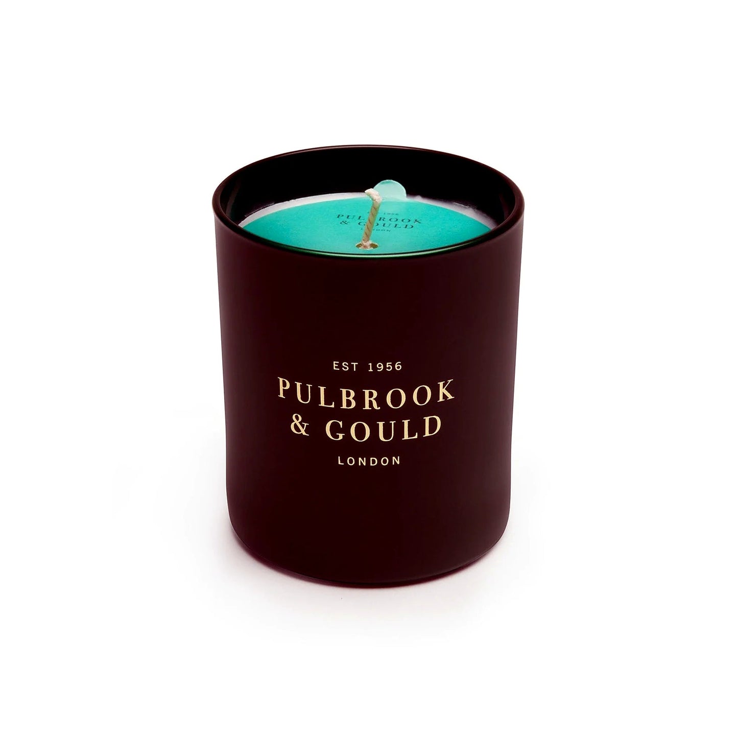 Pulbrook & Gould Winter Scented Candle lit, showing wax and wick detail