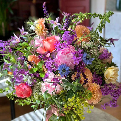 
                    
                      Summer Enchantment by Pulbrook and Gould vase arrangement with pink, purple and orange fresh cut flowers
                    
                  