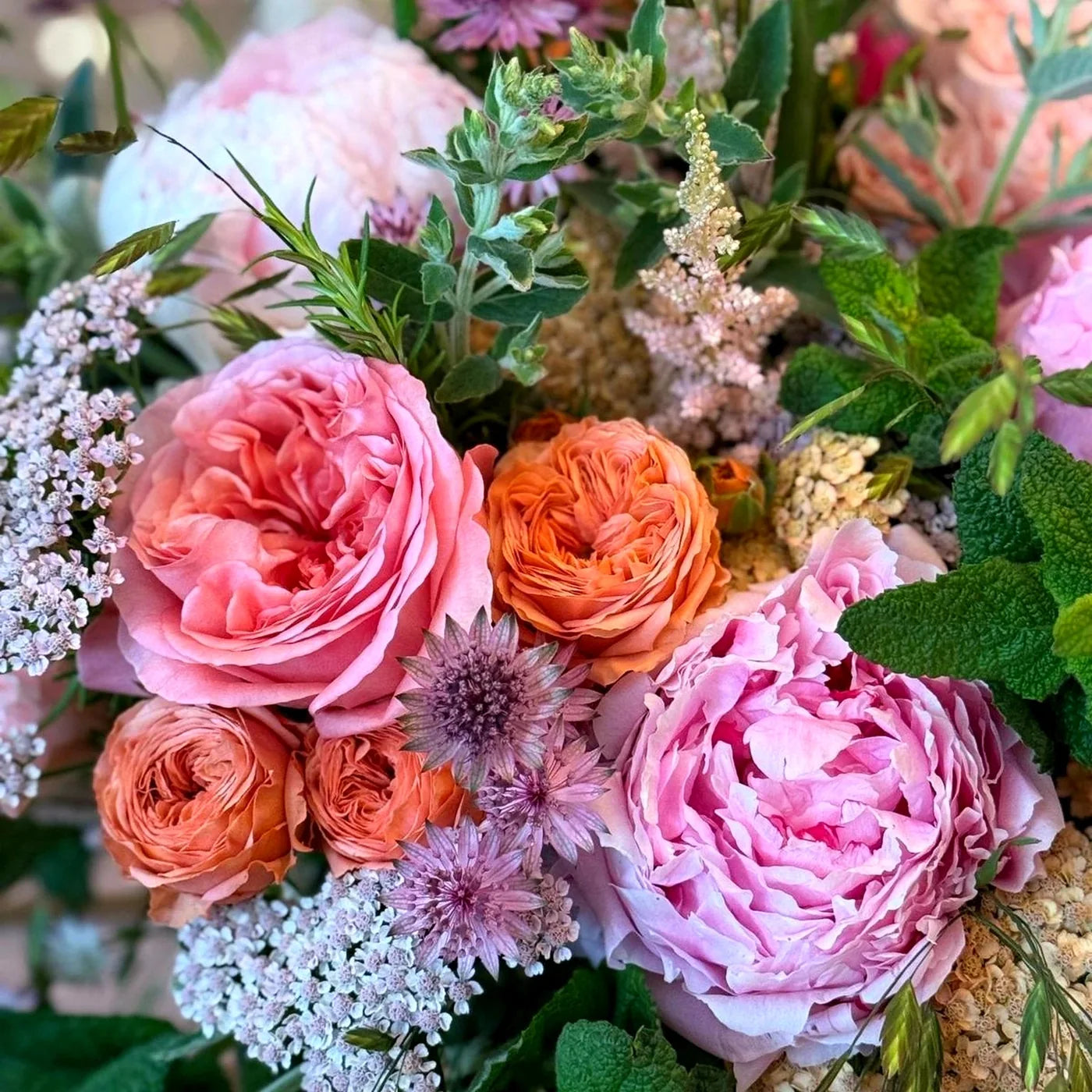 Summer Joy hero bouquet with pink garden roses, peonies and seasonal flowers, by Pulbrook & Gould