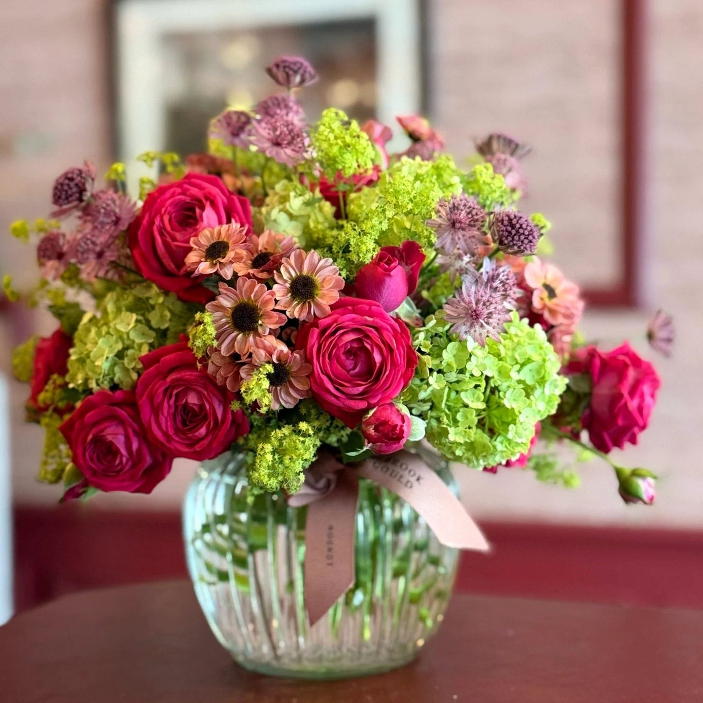 Summer Sparklings Posy by Pulbrook and Gould hand tied posy bouquet with pink roses and green foliage