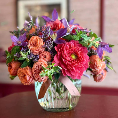 
                    
                      Summer Thrills Posy by Pulbrook and Gould fresh-cut floral posy bouquet in pink and purple with spray roses
                    
                  
