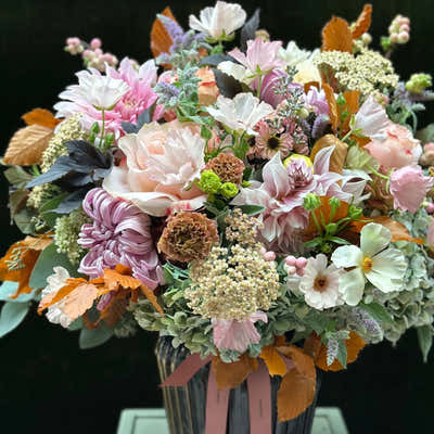 
                    
                      The Albany hand-tied bouquet and vase arrangement with pink, white and orange blooms
                    
                  