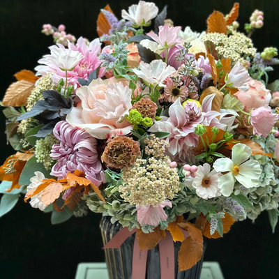 
                    
                      The Albany by Pulbrook Gould hand-tied bouquet and vase arrangement with pink, white and orange blooms
                    
                  