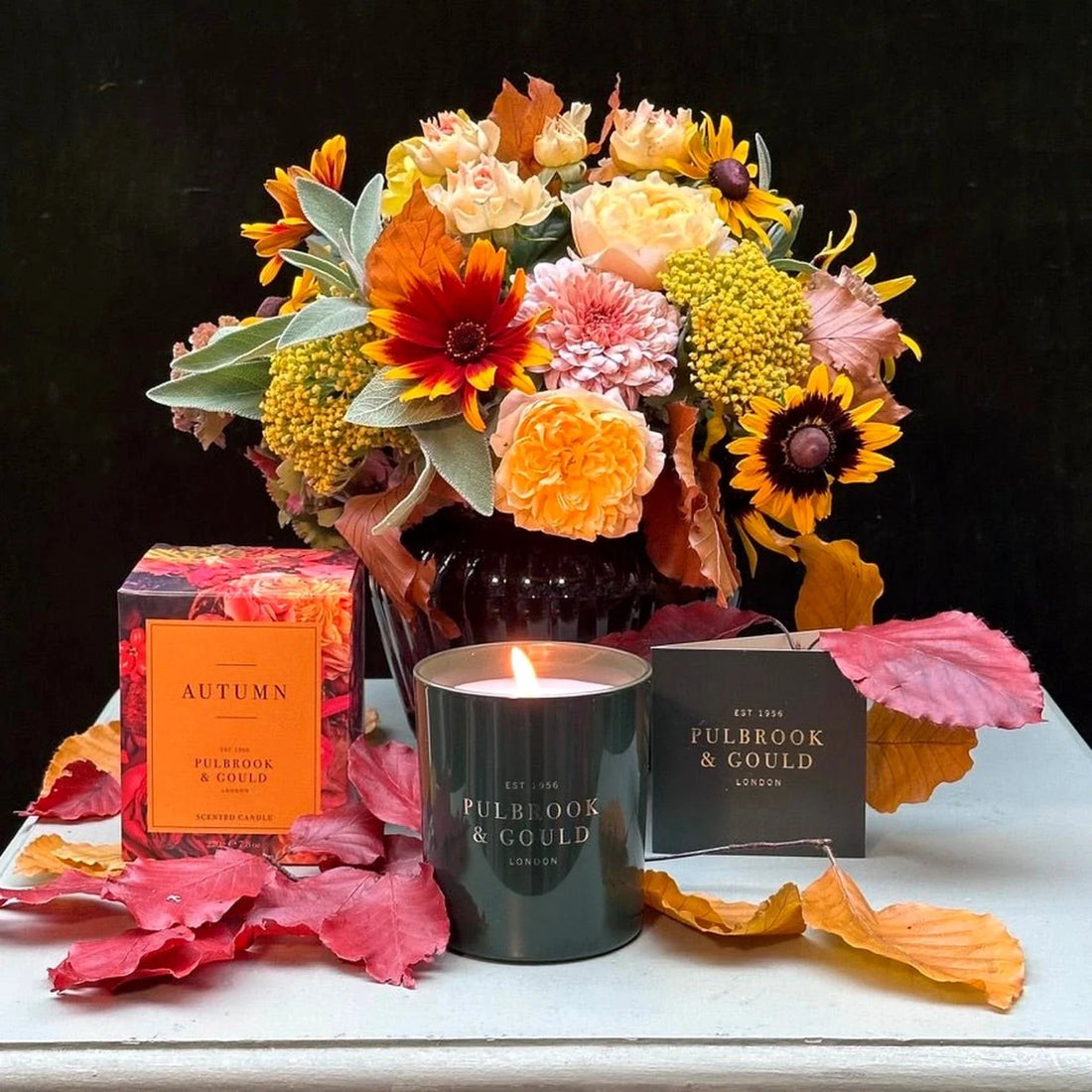 The Windsor Posy by Pulbrook & Gould, gold rudbeckia and apricot rose posy with acid-yellow achillea and dusty miller foliage