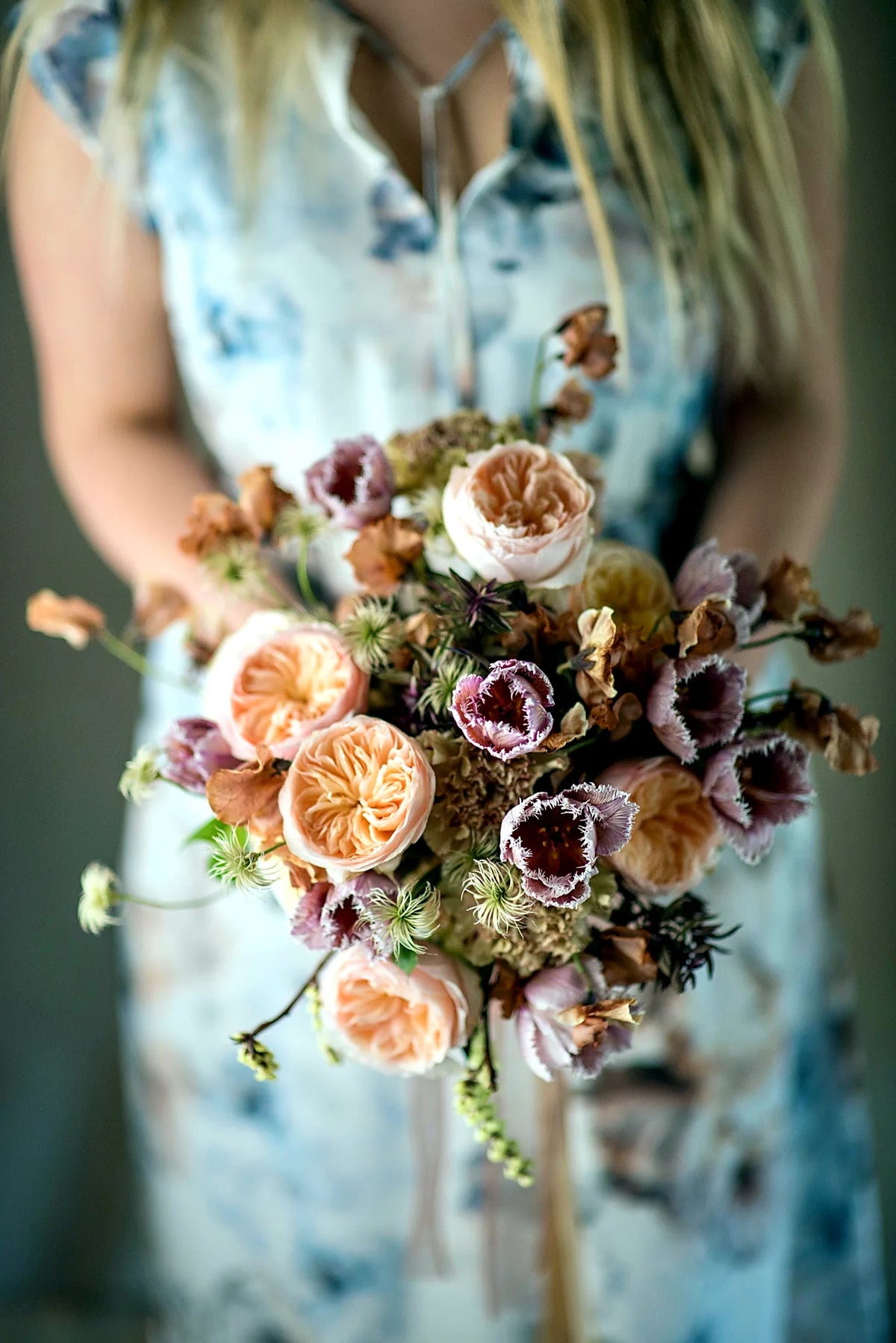 Autumnal peach and burgundy bridal bouquet with garden roses by Pulbrook & Gould