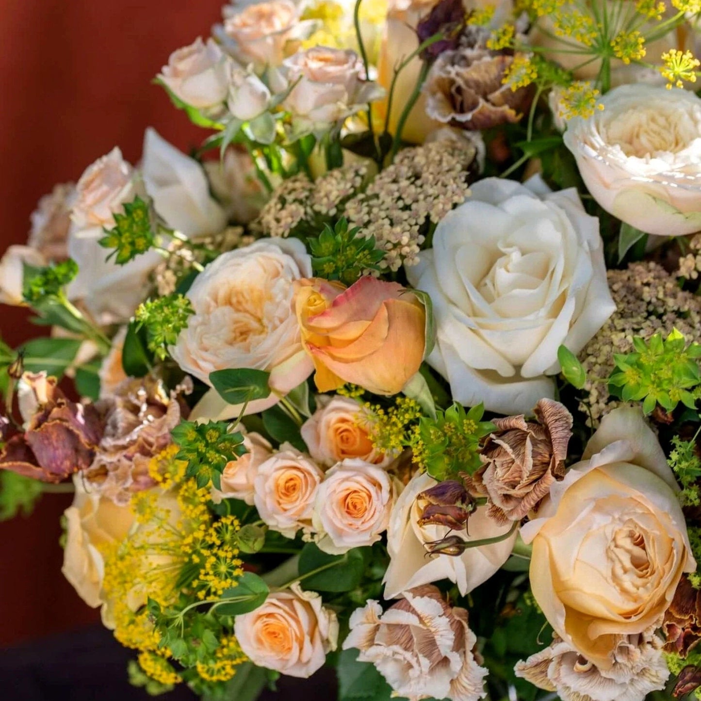 White and Peach Floral Harmony by Pulbrook Gould hand-tied bouquet and vase arrangement with roses and astrantia