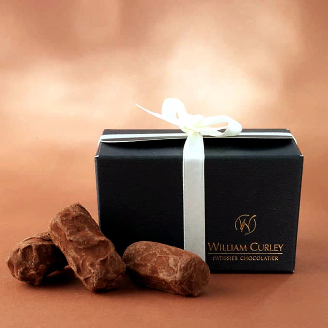 William Curley Dark Truffles by Pulbrook and Gould chocolate truffles gift box in dark brown with fresh truffles