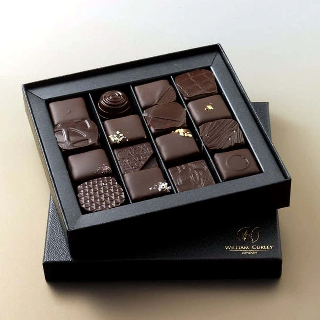 William Curley Handmade Chocolates- 16 Piece by Pulbrook Gould, dark chocolate truffles in a seasonal box