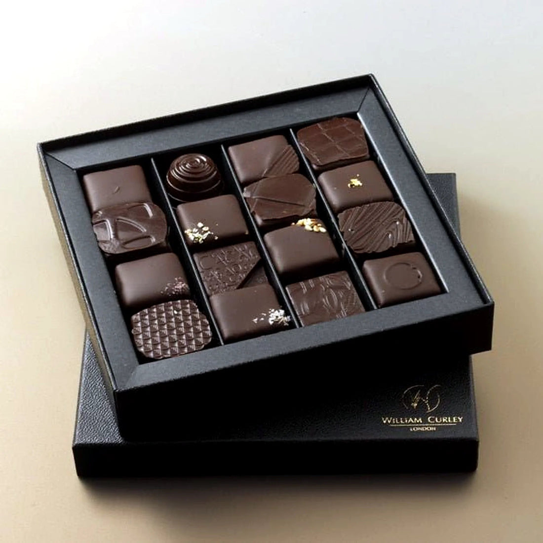 William Curley Handmade Chocolates- 16 Piece by Pulbrook Gould, dark chocolate truffles in a seasonal box