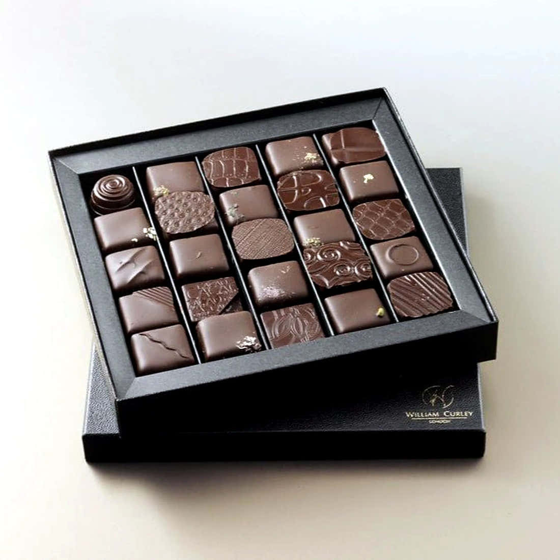 William Curley Handmade Chocolates 25 Piece by Pulbrook and Gould, 25-piece chocolate gift box in dark and milk tones