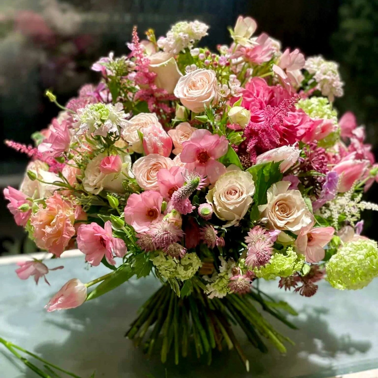You're Sensational Pulbrook Gould hand tied bouquet in soft pink and cream with roses and tulips
