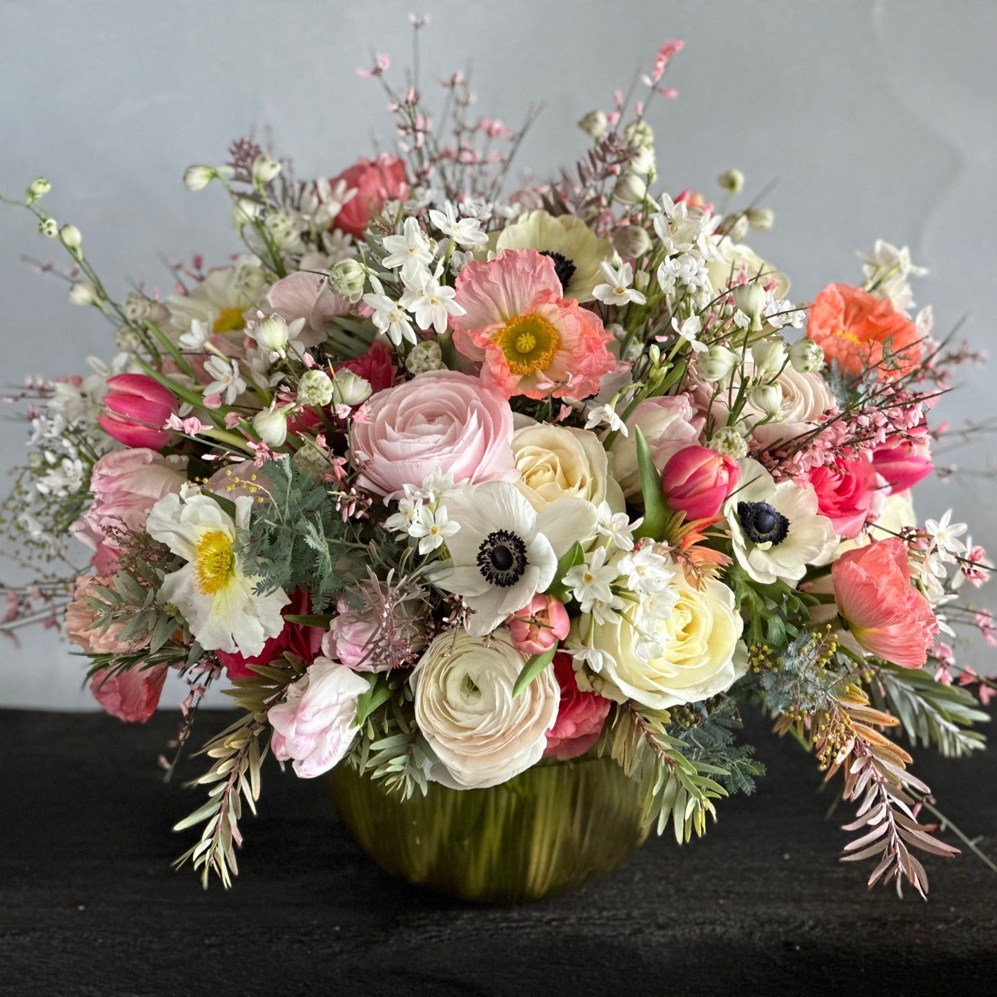 Catherine Mother's Day bouquet by Pulbrook & Gould — white and pink roses, ranunculus, anemones and spring greenery.