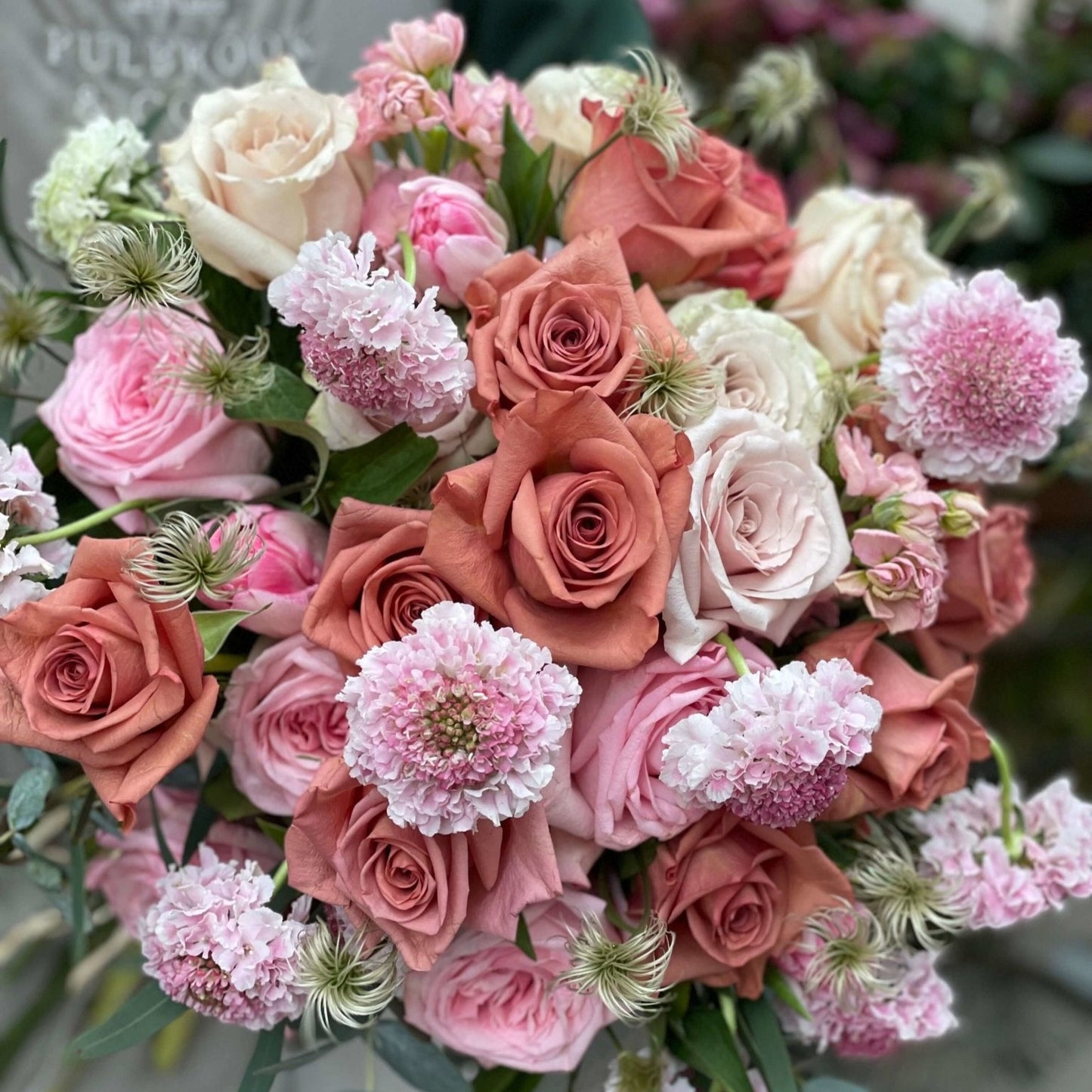 Pastel Perfection Mother's Day hand-tied bouquet by Pulbrook & Gould — soft pink roses, Kibo clematis, pastel stock and eucalyptus