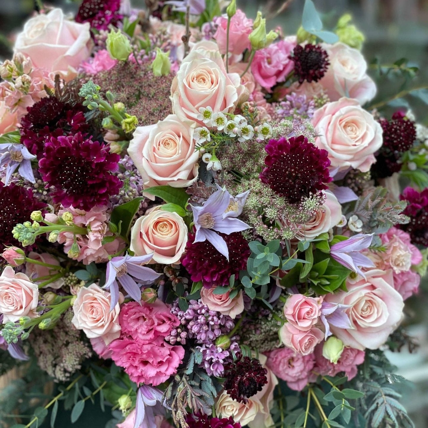 Luxury pastel flower bouquet with roses and scabiosa